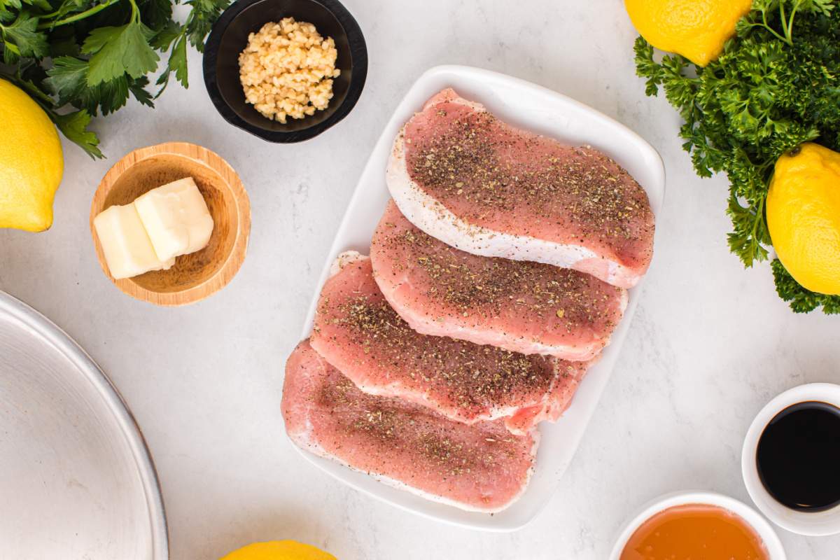 pork chops seasoning on plate