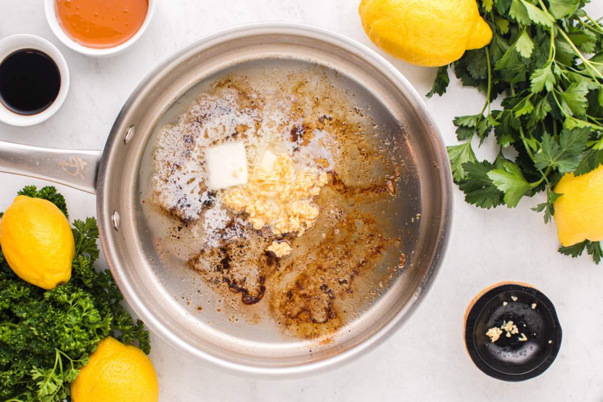 placing butter in pan