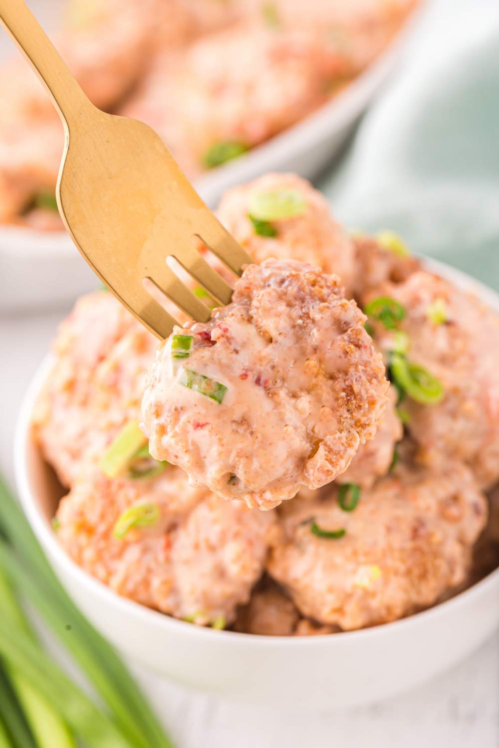 Bang Bang Shrimp in bowl with a fork