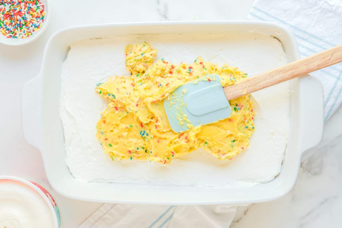 cake mixture spread on top of cream cheese mixture