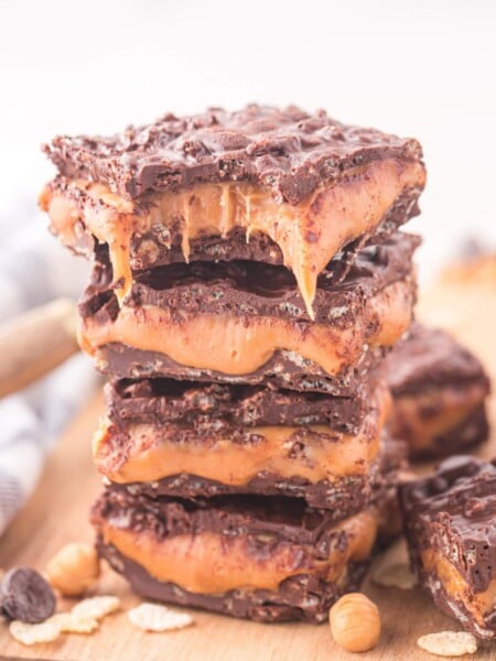 Homemade 100 Grand Bars stacked on a plate