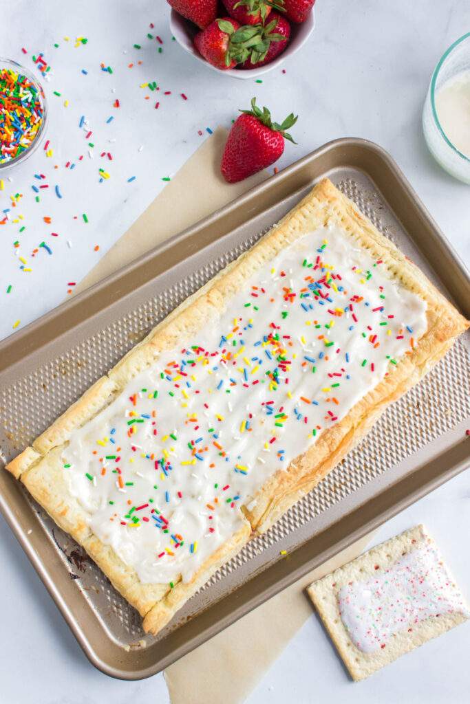 Homemade Giant Frosted Pop Tart on a baking pan