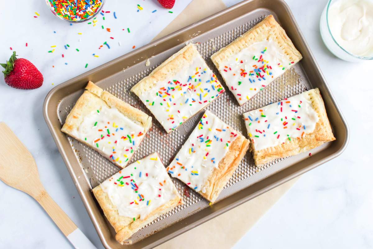 giant poptart cut into 6 pieces on baking sheet