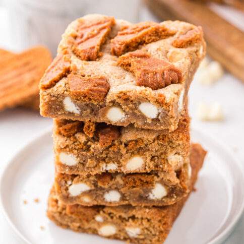 Biscoff Blondies stacked on a plate