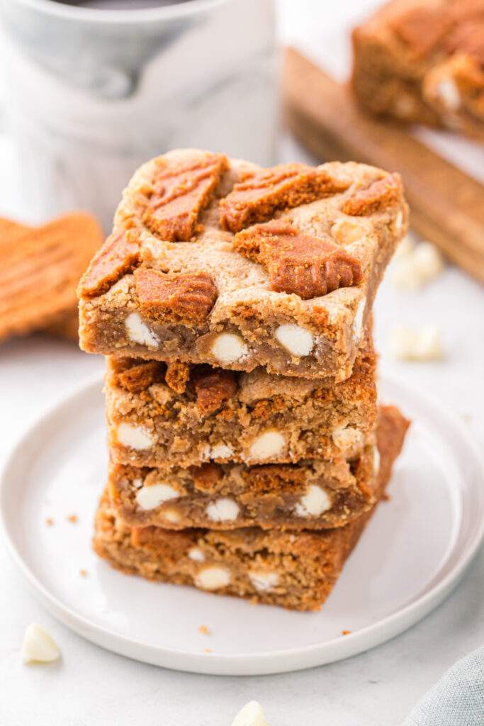 Biscoff Blondies stacked on a plate