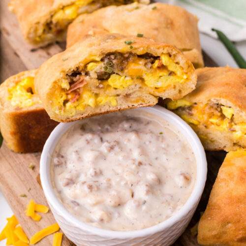 Breakfast Garbage Bread with a small bowl of gravy