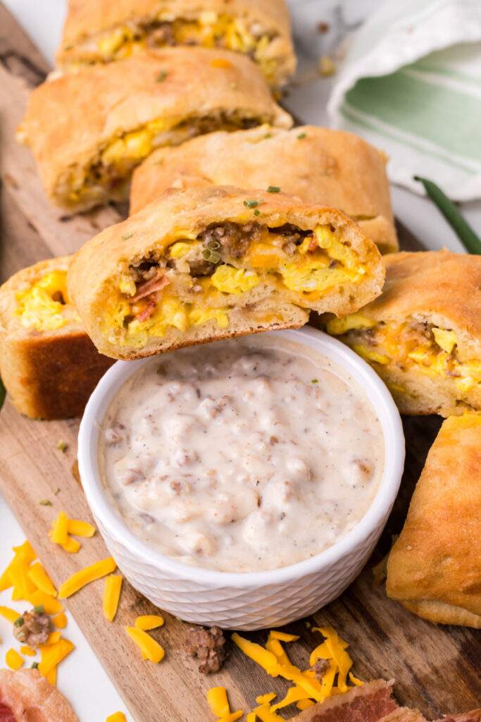 Breakfast Garbage Bread with a small bowl of gravy