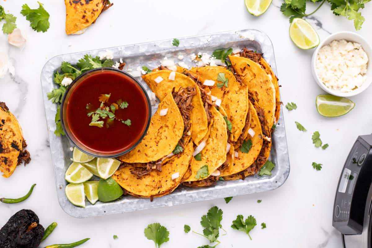 Slow Cooker Birria Tacos on a platter