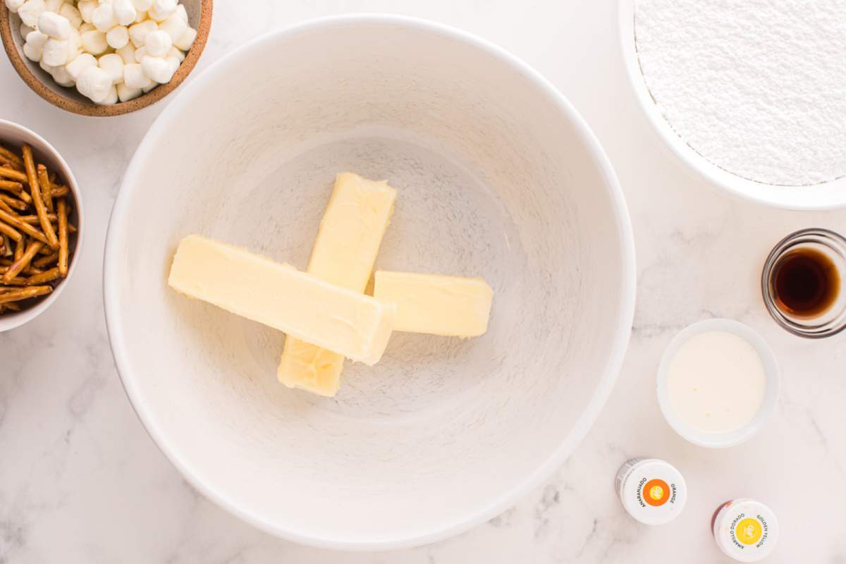 sticks of butter in a mixing bowl