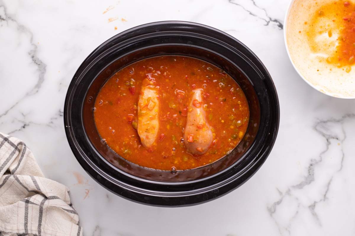 sauce and chicken in slow cooker