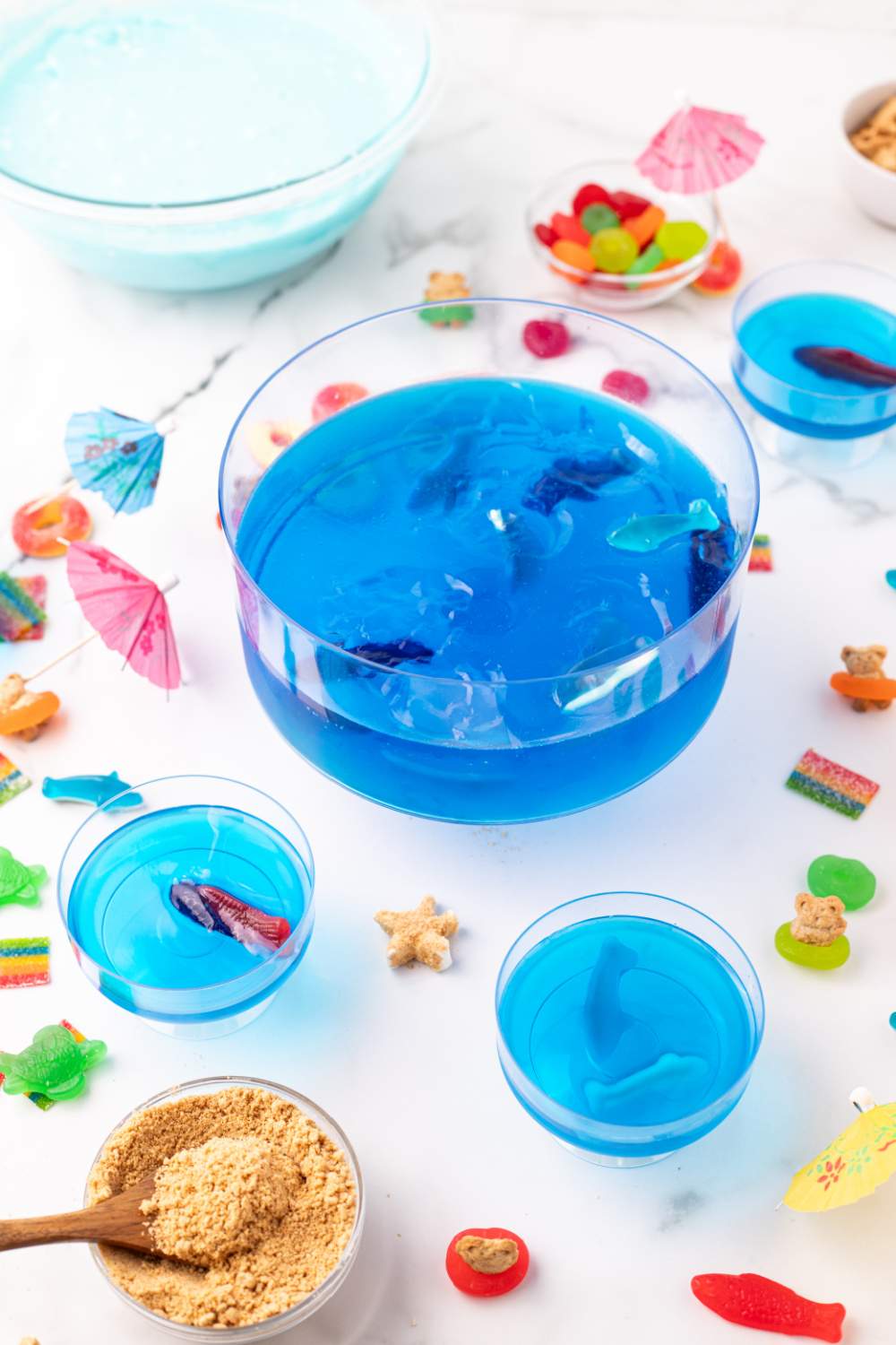 adding gummy sharks and fish into gelatin