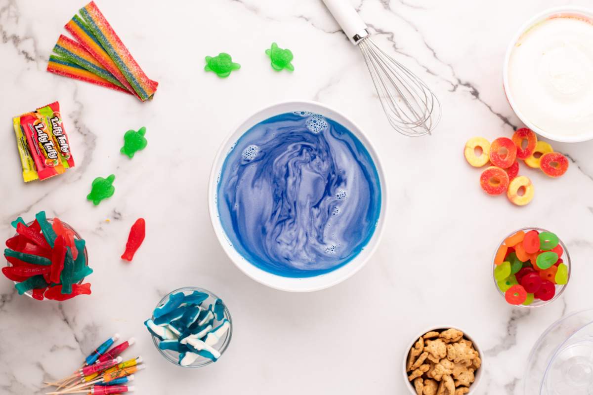 blue gelatin mixture in a bowl