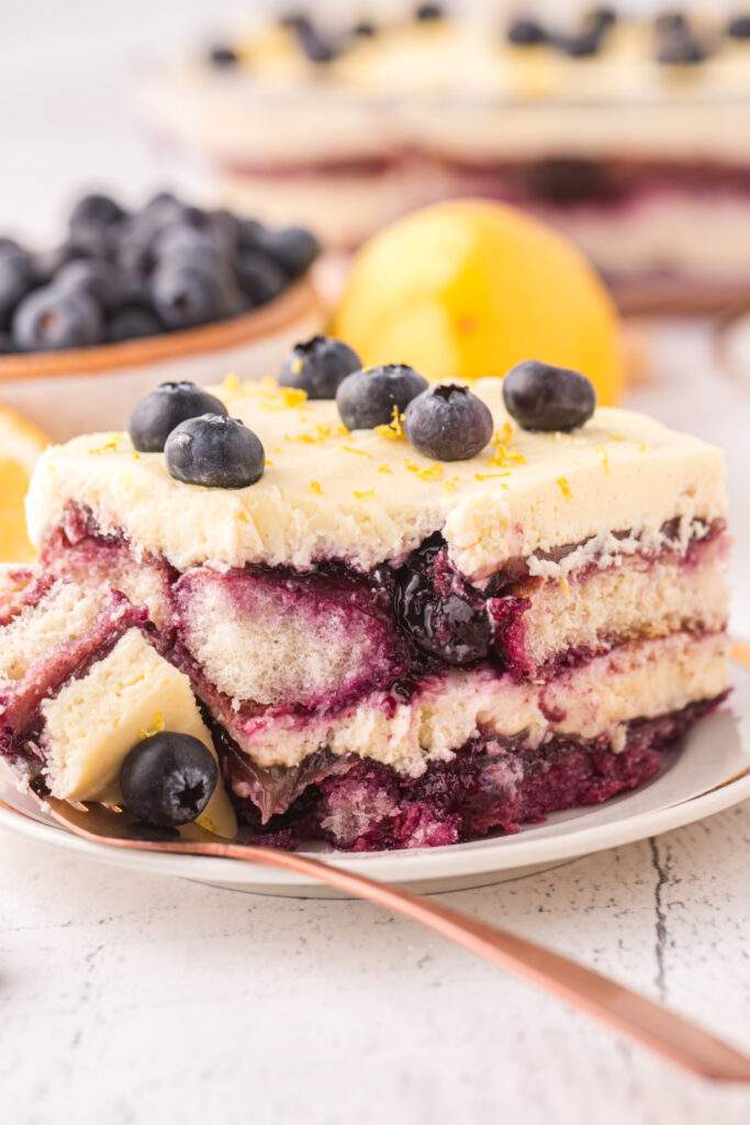 Lemon Blueberry Tiramisu cake on a plate