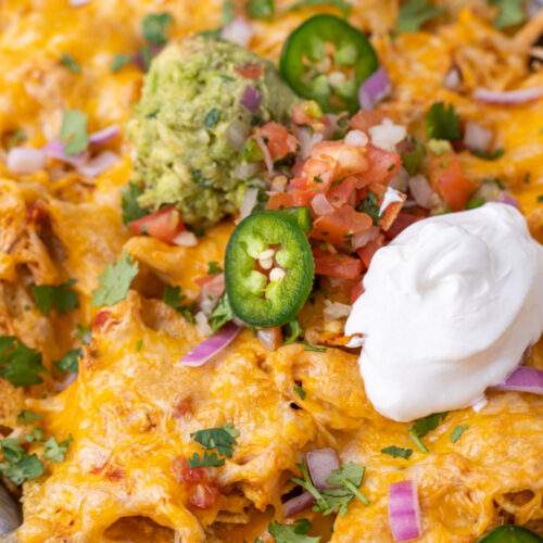 Slow Cooker Chicken Nachos on a baking sheet