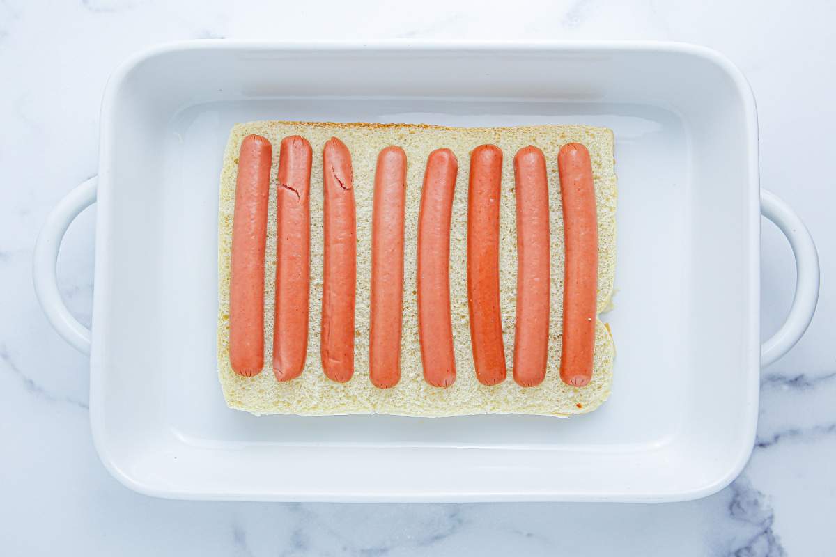 hot dogs on a sheet of buns