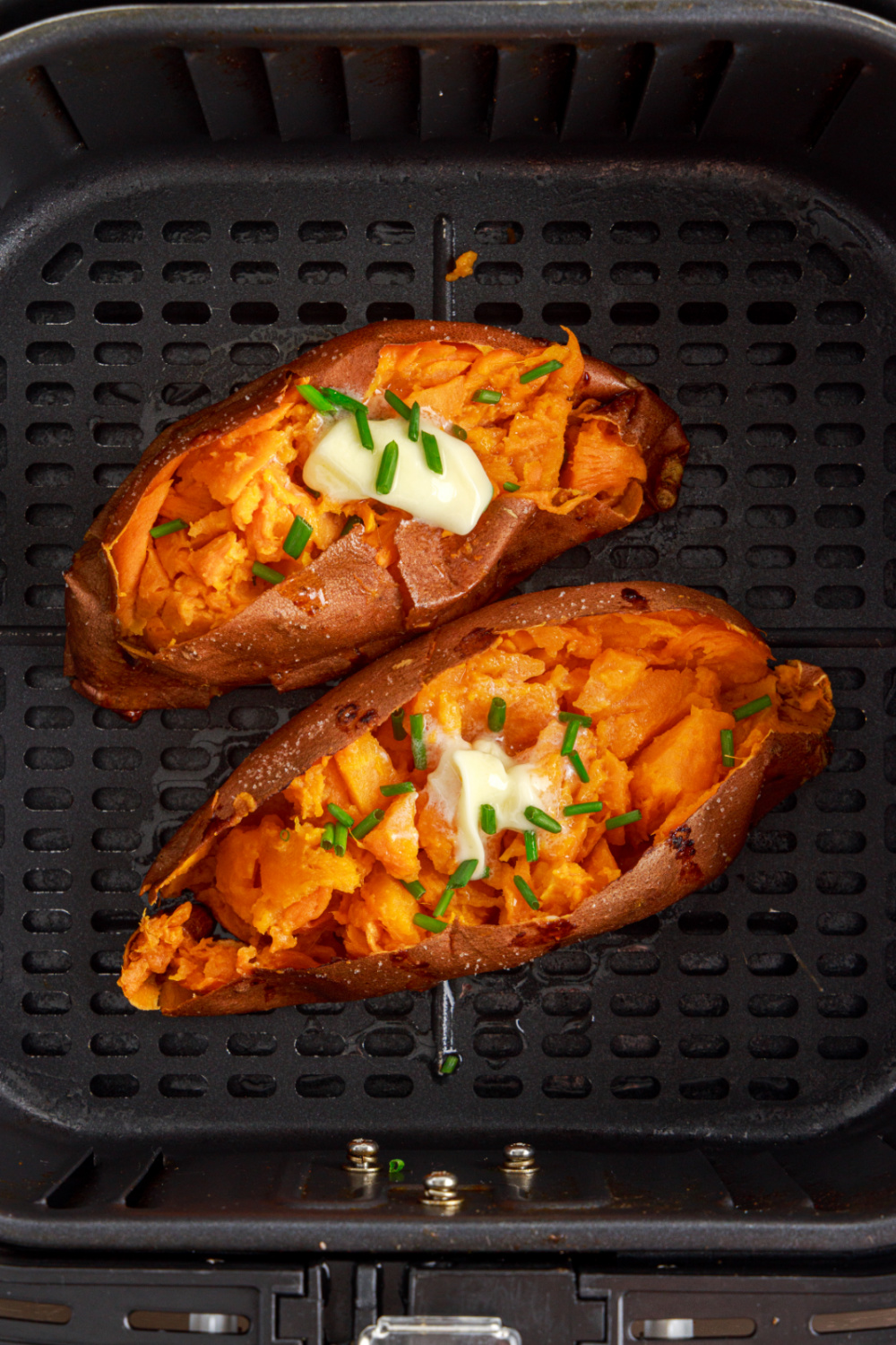 https://www.familyfreshmeals.com/wp-content/uploads/2023/09/Baked-Sweet-Potatoes-in-the-Air-Fryer-7a.jpg