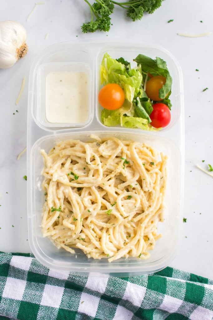 Instant Pot Cheesy Garlic Butter Spaghetti packed in an lunchbox