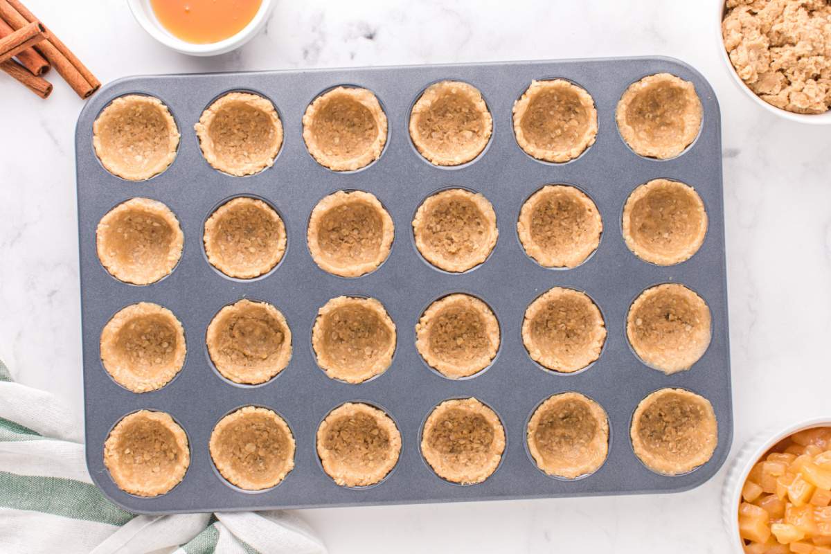 crust pressed into mini muffin tin