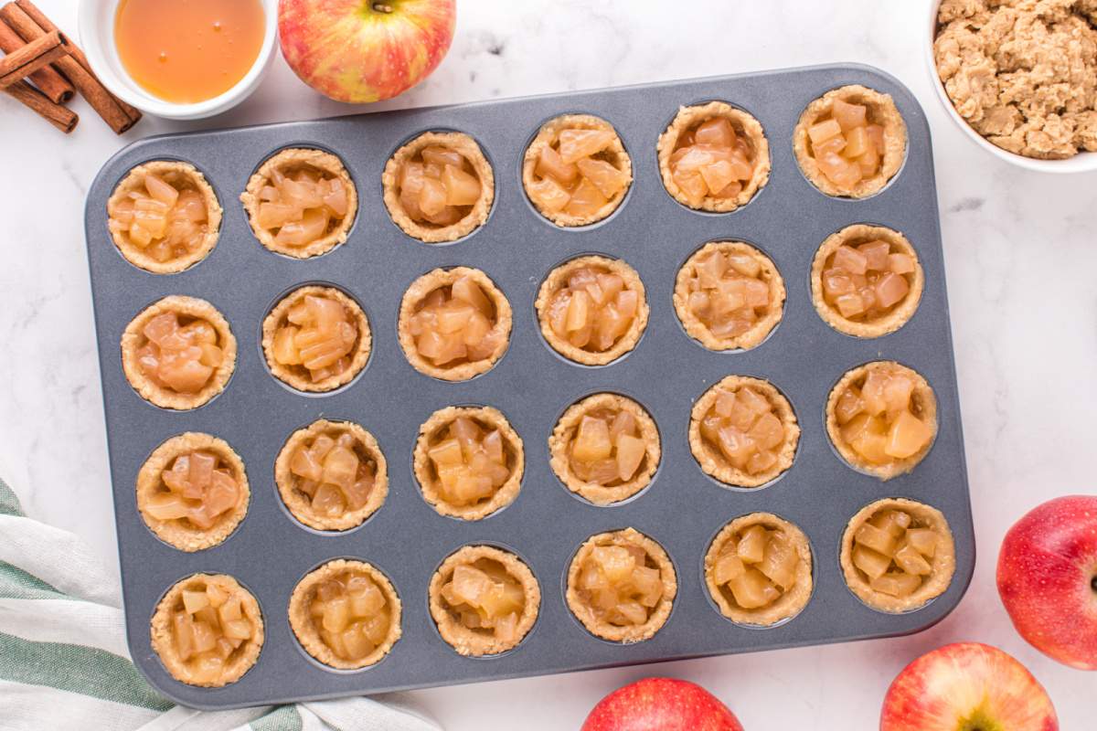 apple filling placed into crusts