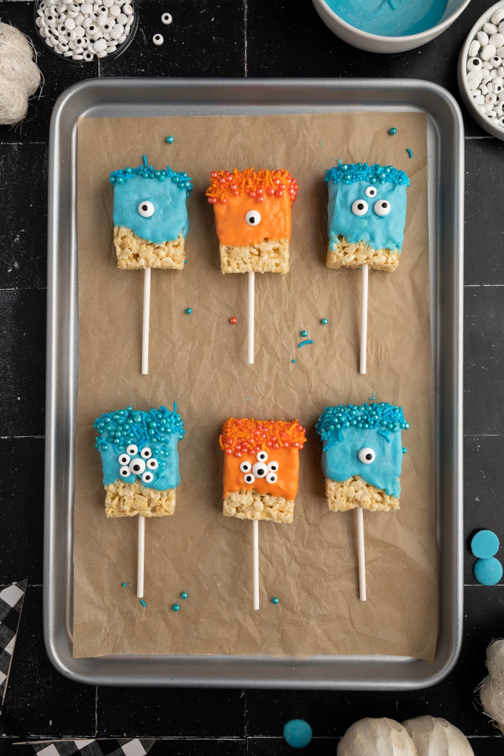 Monster Pops Rice Krispies Treats on baking sheet
