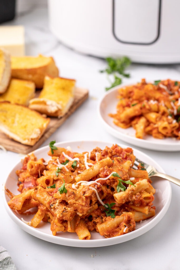Slow Cooker Baked Ziti on two plates