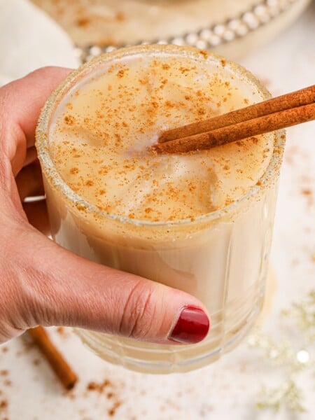 Hand holding Cinnamon White Russian