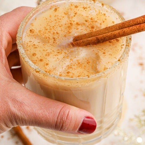 Hand holding Cinnamon White Russian