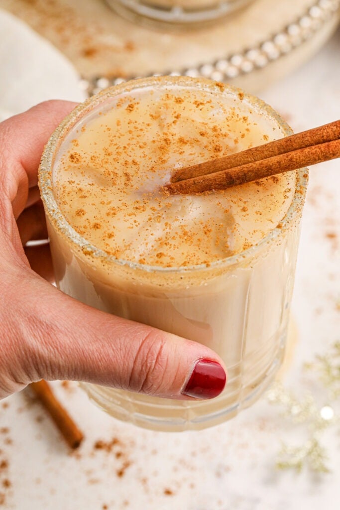 Hand holding Cinnamon White Russian