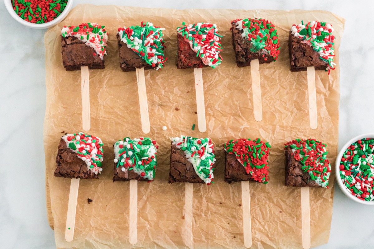 Christmas Brownie Pops on parchment paper