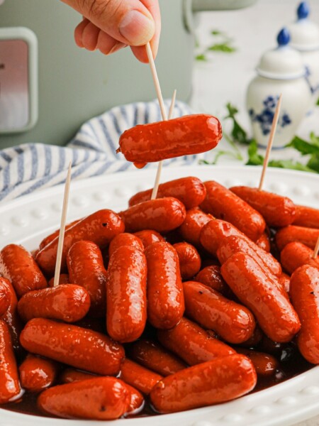 Slow Cooker Spicy Sweet BBQ Lil Smokies on a plate with toothpicks
