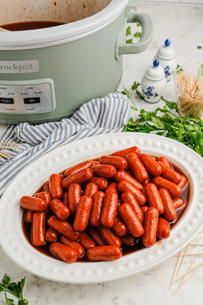Slow Cooker Spicy Sweet BBQ Lil Smokies on a plater