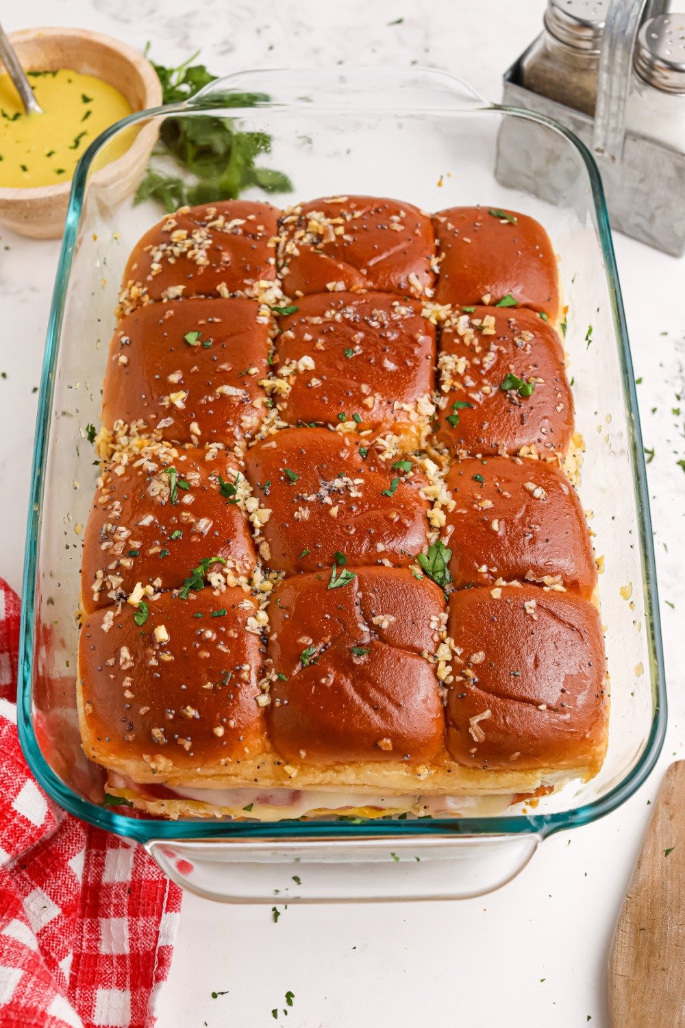 cooked sliders in a baking dish