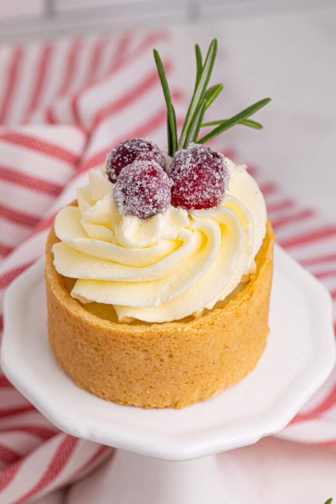 sugared cranberries on top of a pastry