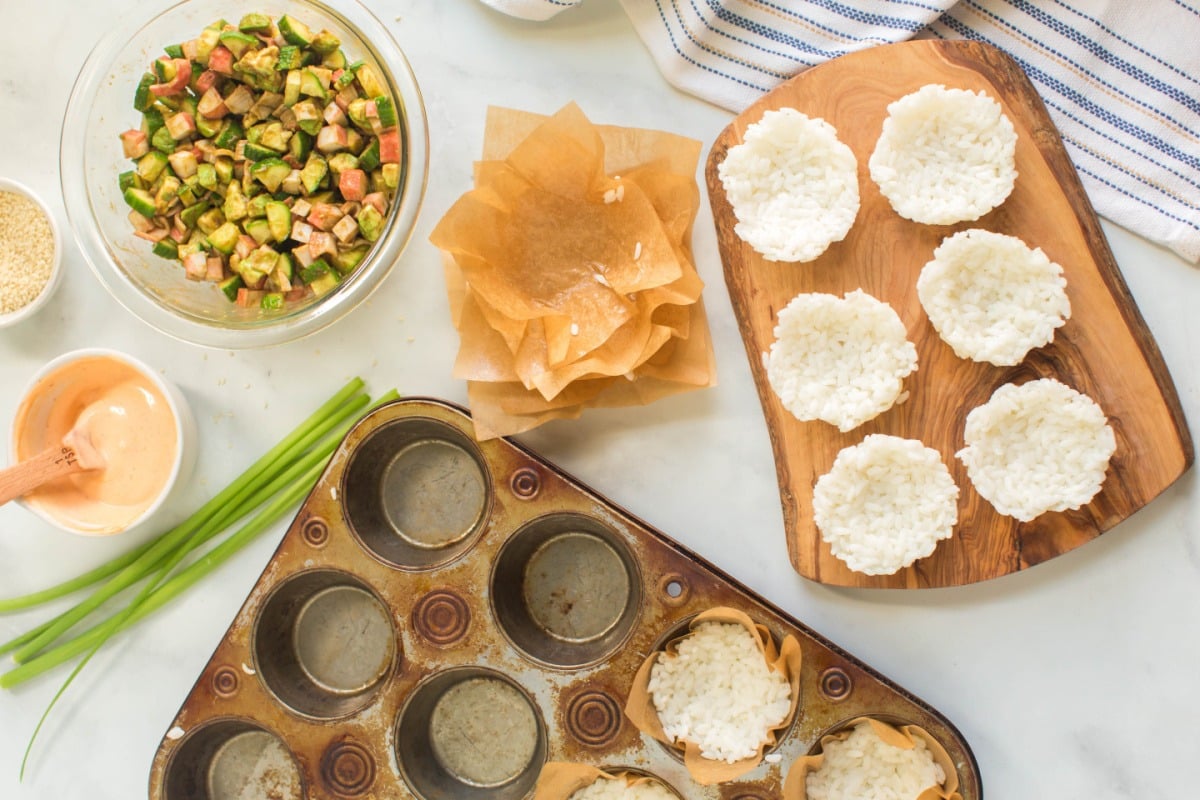 removing rice from muffin tin