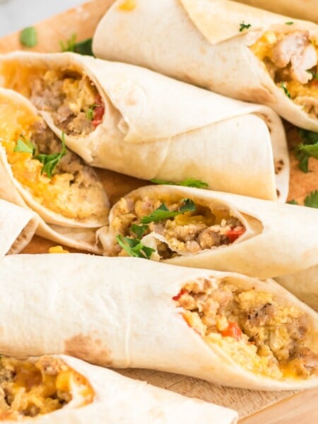 Freezer Friendly Breakfast Taquitos on a serving board