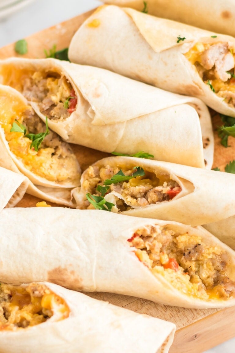 Freezer Friendly Breakfast Taquitos on a serving board