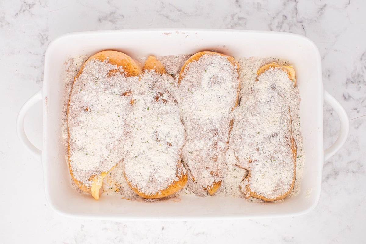 seasoning adding to top of chicken