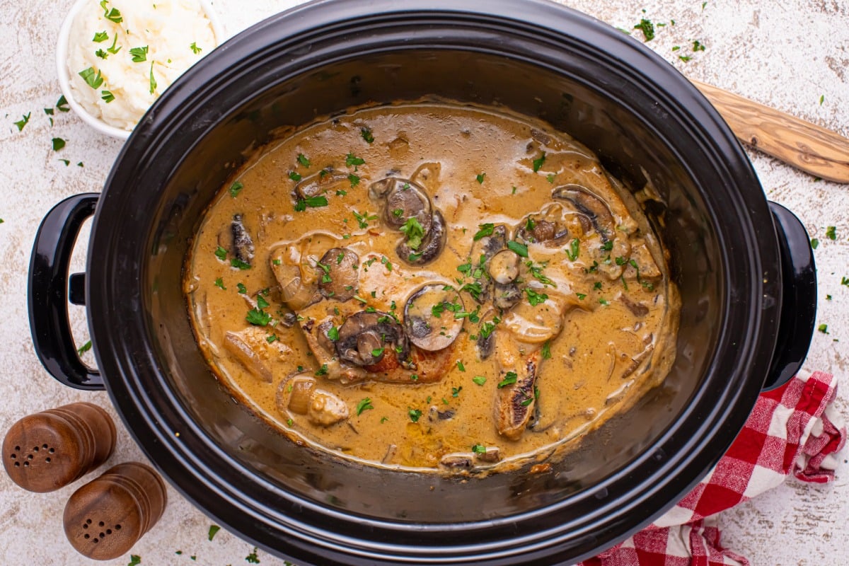 Slow Cooker Pork Chops with Mushroom Gravy in a slow cooker