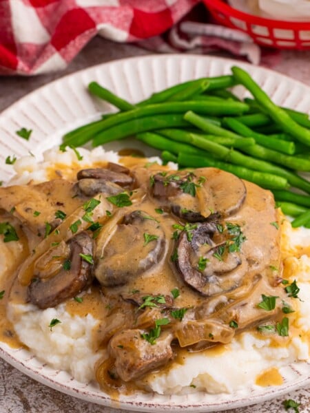 Slow Cooker Pork Chops with Mushroom Gravy on a plate