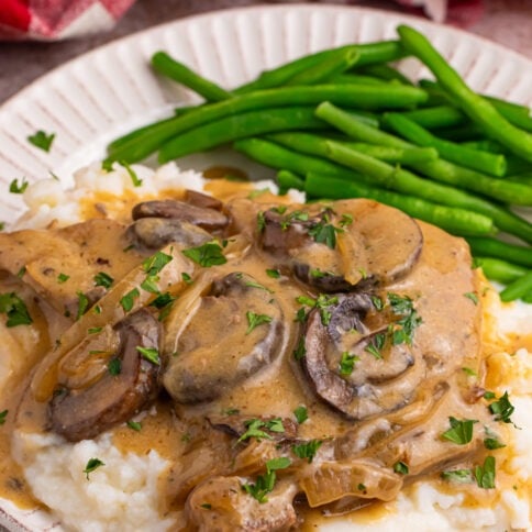 Slow Cooker Pork Chops with Mushroom Gravy on a plate