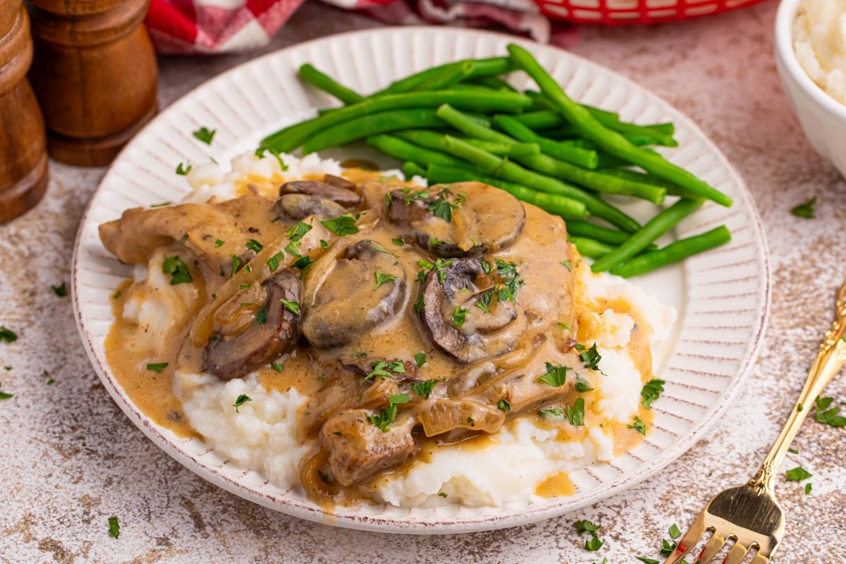 Slow Cooker Pork Chops with Mushroom Gravy on a plate