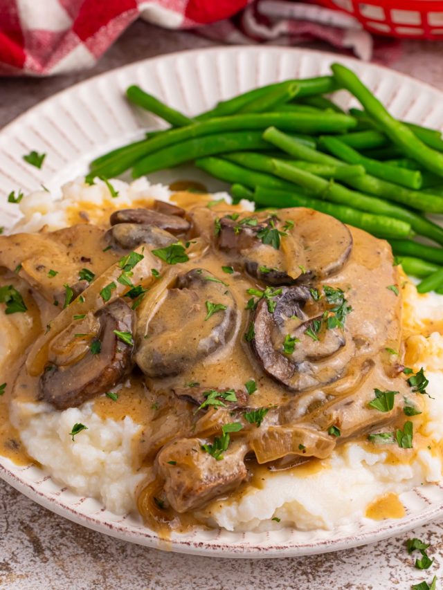 Slow Cooker Pork Chops with Mushroom Gravy on a plate