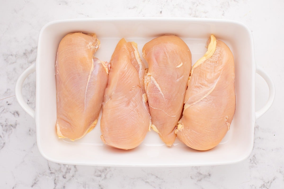 4 chicken breasts in a baking dish