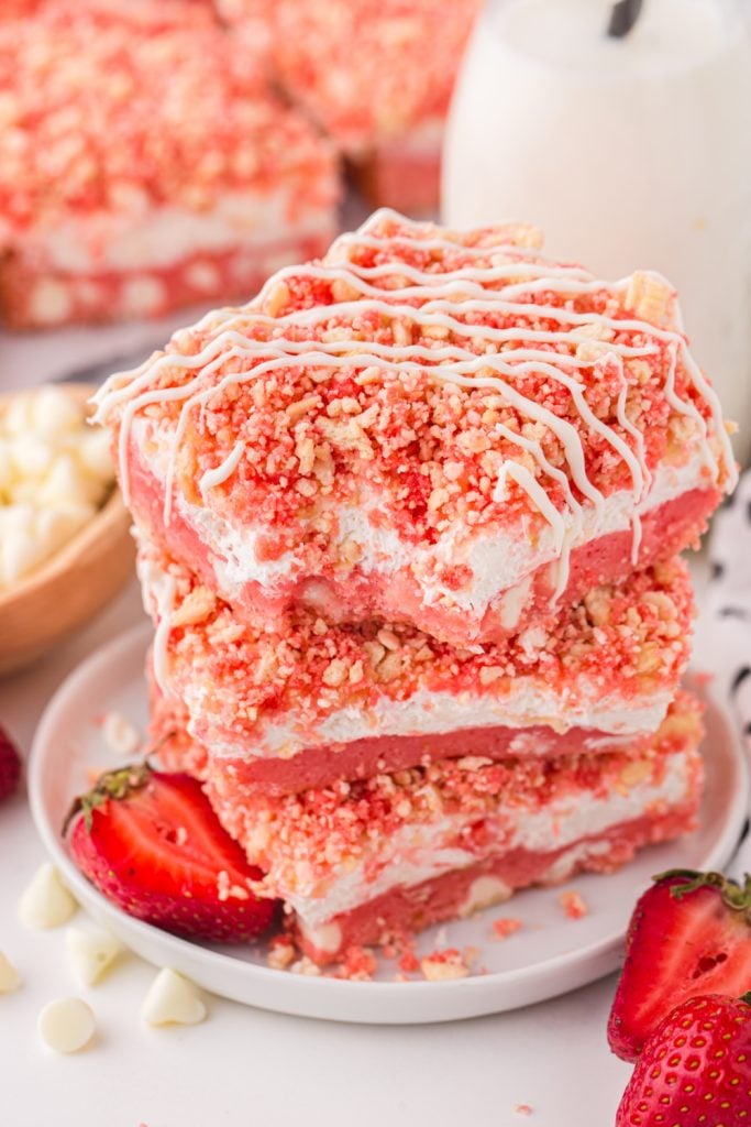Strawberry Crunch Brownies stacked on a plate