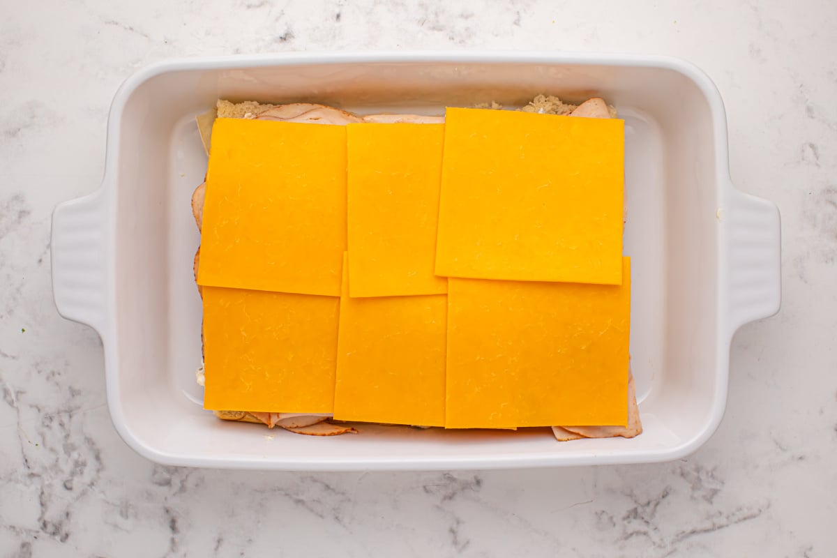 slice cheese added to top of chicken slices
