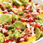 Loaded BBQ Chicken Nachos on a platter