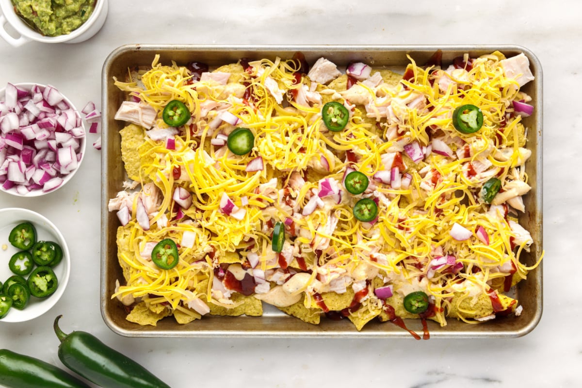 nachos on baking sheet