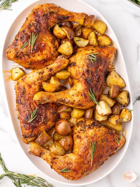 Rosemary Garlic Chicken Quarters on a serving platter