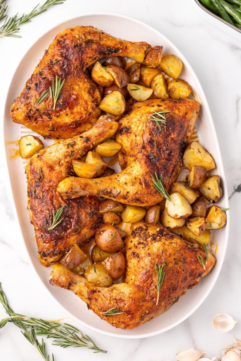 Rosemary Garlic Chicken Quarters on a serving platter