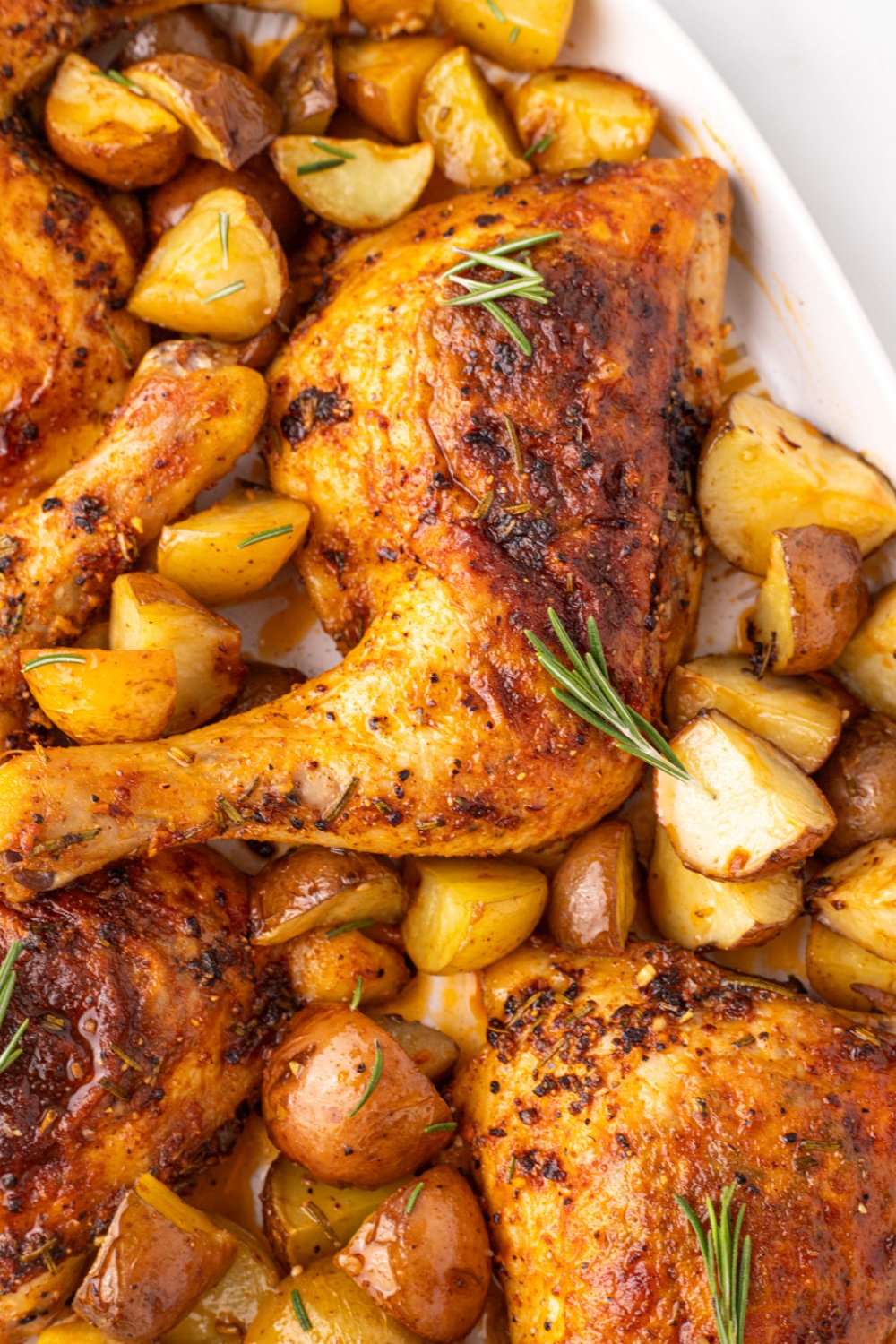 Rosemary Garlic Chicken Quarters on a serving platter